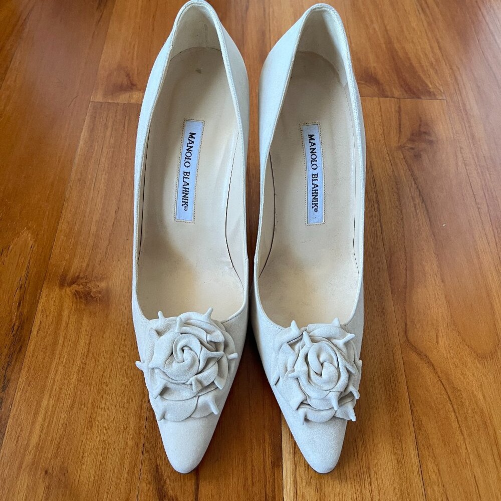 Manolo Blahnik Cream Pointed-Toe Pumps with Rosette Detail